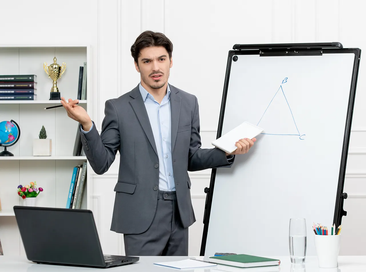 Instructor explaining a concept at a whiteboard, representing Icanio career guides for students